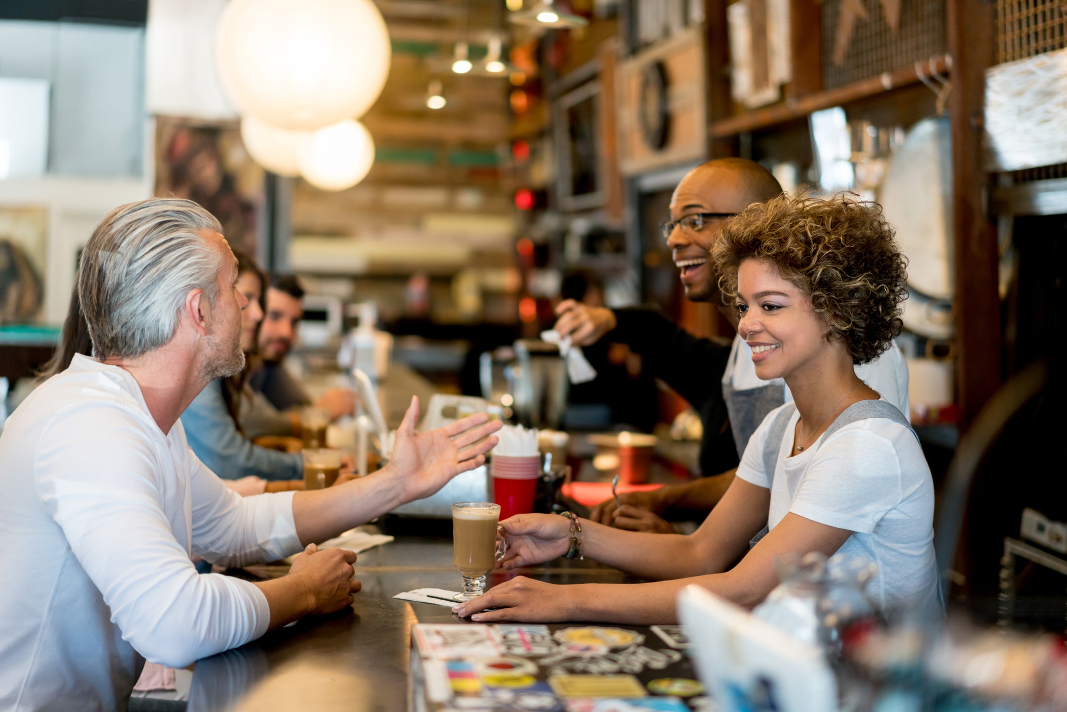 Group of friends having coffee