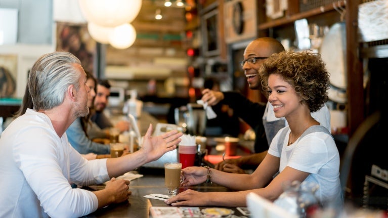 Group of friends having coffee