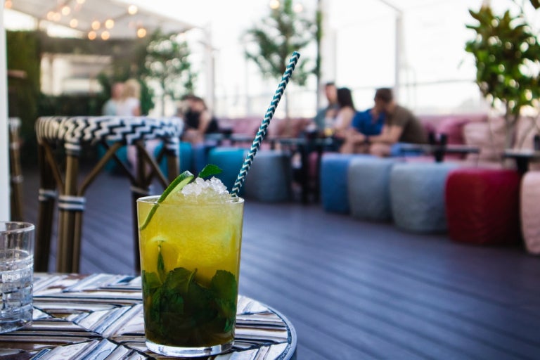 An iced cold drink placed at the top of a table